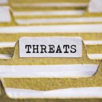 File tab labeled "Threats" in focus.