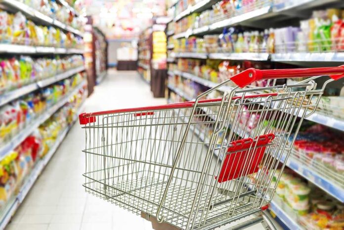 171787895 featured image Empty shopping cart in grocery store aisle.
