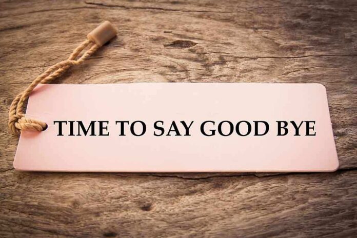546660592 featured image Sign reads "TIME TO SAY GOOD BYE" on wood.