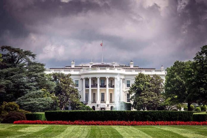 562939351 featured image White House front view with dark clouds above.