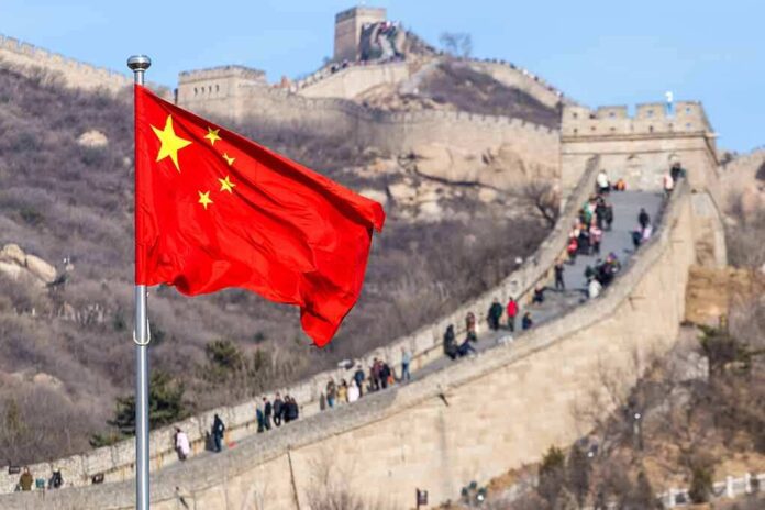 Chinese flag by the Great Wall of China