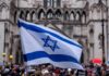 Israeli flag at a crowded outdoor event