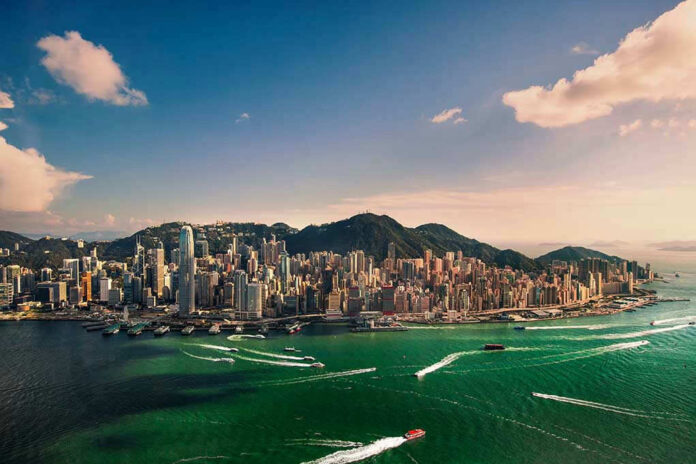 1011338440 Aerial view of a coastal city with skyscrapers