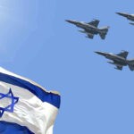 Israeli flag with three fighter jets flying overhead