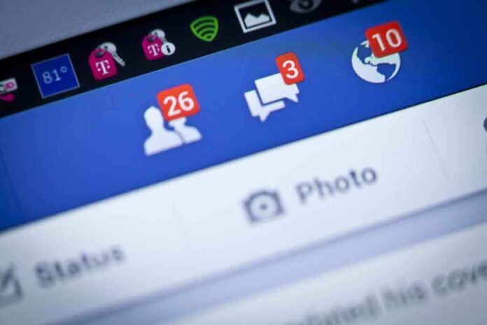 Close up of a smartphone screen displaying Facebook notifications