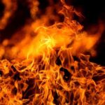 Close-up of vibrant flames against a dark background