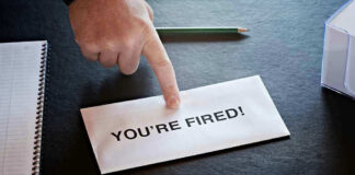 Envelope with YOURE FIRED! and pointing finger.