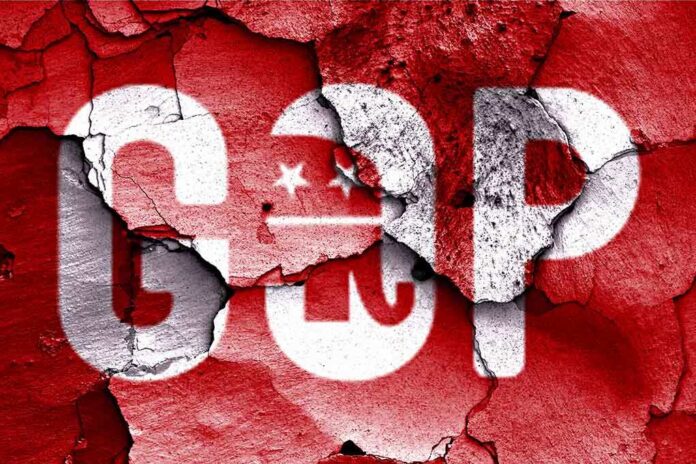 shutterstock_228973474.jpg Cracked wall featuring the GOP logo in red and white