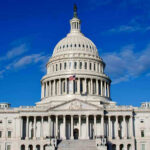 Congressional VIP Perk TAKEN AWAY And They’re Fuming! US Capitol Building against blue sky.