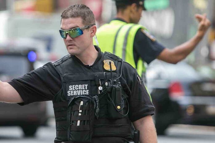 A Secret Service agent directing traffic in an urban setting