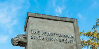 The Pennsylvania State University stone pillar with lion sculpture.
