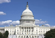 Basic Biology MELTDOWN Stuns Congress U.S. Capitol building against blue sky.