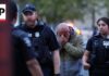 Police arrest one and search for another in Seattle shooting that killed 3