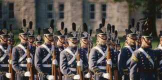 Uniformed soldiers in formation during a military parade