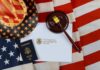 Trump ACTIVATES Secret Terror Court U.S. passport, gavel, and USCIS document on American flag