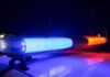 Five Officials Including Mayor ARRESTED For Fraud Police car light bar flashing blue and red at night