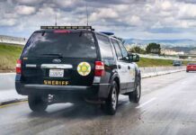 100-MPH Getaway UNRAVELS On Freeway Sheriff SUV driving on a highway