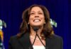 Kamala Makes Huge Blunder as She Relaunches Radical 2028 Platform smiling woman speaking at a podium