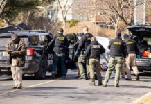 Sex Predator Maniac Terrorizes Neighborhood in Worst Possible Way Police and sheriff officers gather around vehicles on a suburban street