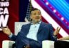 Ted Cruz Teases 2028 Bid After CLASH With Vance man in blue suit speaking on stage