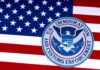 U.S. immigration and customs enforcement seal on American flag