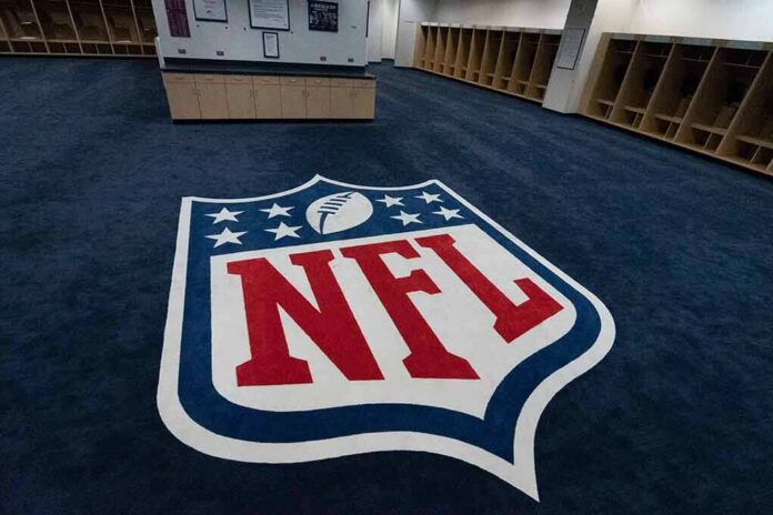 shutterstock_1163596087 NFL logo on the floor of an empty locker room