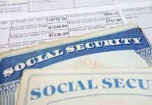 ICE Nabs Illegals in Social Security Sting Social Security cards on top of a tax form