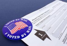 Major Change Made to Mail-In-Ballot Voter Form I Voted by Mail sticker on absentee ballot application form