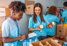 Volunteers sorting food donations in a community center