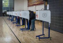 Candidate BANNED After Disgraceful Scheme Caught Voters at polling booths in a gymnasium