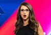 ‘I’m Not a Lesbian’: Boebert Blasts Ethics Complaint Allegations Woman with glasses speaking on stage with colorful backdrop