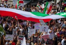 Iran Protestors ERUPT In NYC Amid UN Gathering Protest crowd with flags and signs; Seyed Ebrahim Raisi, La Parka, Brian Robiskie, Philly Brown, Miguel Francisco Barragán Andrade present