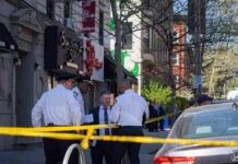 Top Dem INDICTED In Federal Loan Fraud Case police officers and investigator at a taped-off city sidewalk