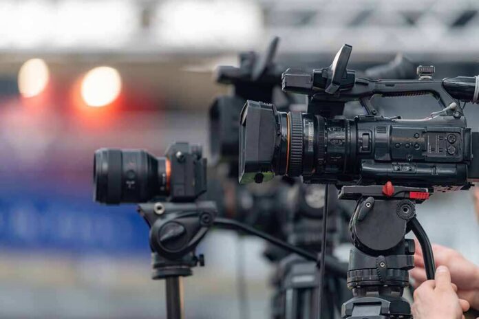 Multiple,Professional,Video,Cameras,On,Tripods,For,Event,Recording.,Multi Professional video cameras on tripods