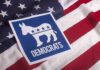 Dem Candidate BLASTED After Repeated Homophobic Slurs Democratic Party donkey symbol on American flag