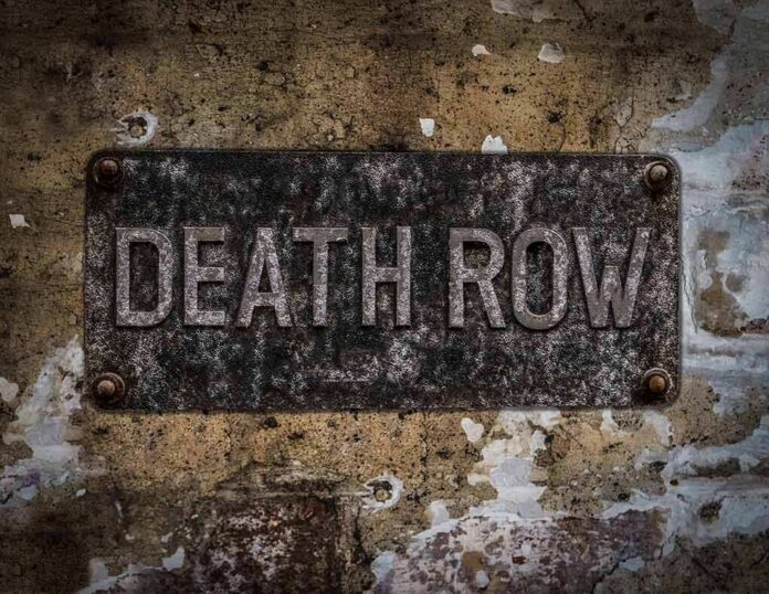 Rusty metal sign on worn concrete wall