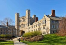 University Tennis Team SUSPENDED Over Disgusting Racist Image Gothic-style college building with archway and towers