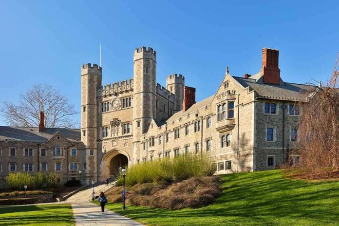 shutterstock_1079230778 Gothic-style college building with archway and towers