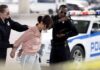 Cheerleader PUMMELED To The Ground By Cops During Arrest Police officers detain a woman beside a patrol car