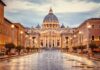 Popes Cancer Diagnosis STUNS – Vatican Statement St. Peter's Basilica at the end of a wet street at dusk