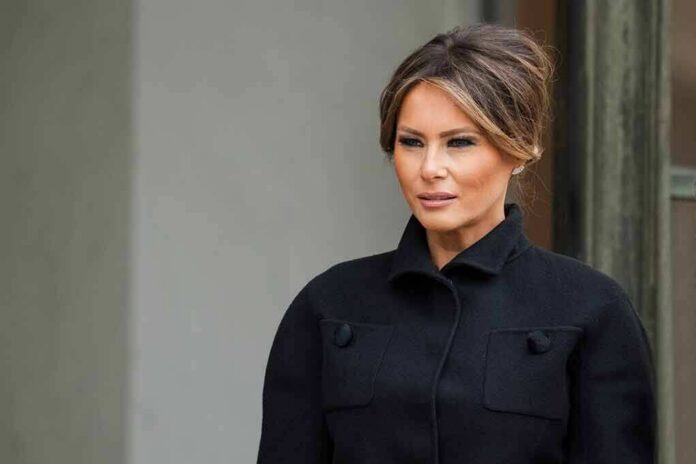 shutterstock_1232034112 Melania Trump in a black coat looking to the side