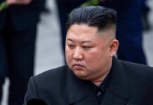 N.Korea Successfully Tests Underwater Nuke Kim Jong-Un looking to the side in a dark overcoat