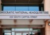 DNC Sues Trump Over Voting Change for Americans Abroad Entrance to Democratic National Headquarters building
