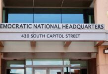 DNC Sues Trump Over Voting Change for Americans Abroad Entrance to Democratic National Headquarters building