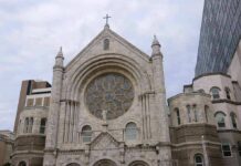 Catholic Church Cover-Up Exposed – Nearly 1,000 Kids Stone church facade with large rose window and cross