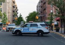 Coked-Up Driver Runs Down Baby in Stroller! NYPD police SUV blocking a city street at a taped-off scene