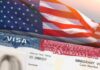 US visa document with American flag in background