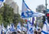 Israel Has First Election Since Oct 7th Attacks Israeli flags waved at a street demonstration