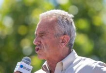 RFK Jr. Goes on Stunning Rant Against Arabs Robert F. Kennedy Jr. speaking into a microphone outdoors