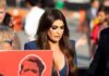 Kimberly Guilfoyle INVESTIGATED After Lavish Ambassador Lifestyle Explosed Kimberly Guilfoyle walking outdoors among a crowd